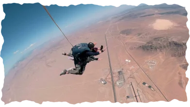 Wide view of tandem freefall over desert