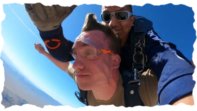 Man mid-air during tandem skydive freefall